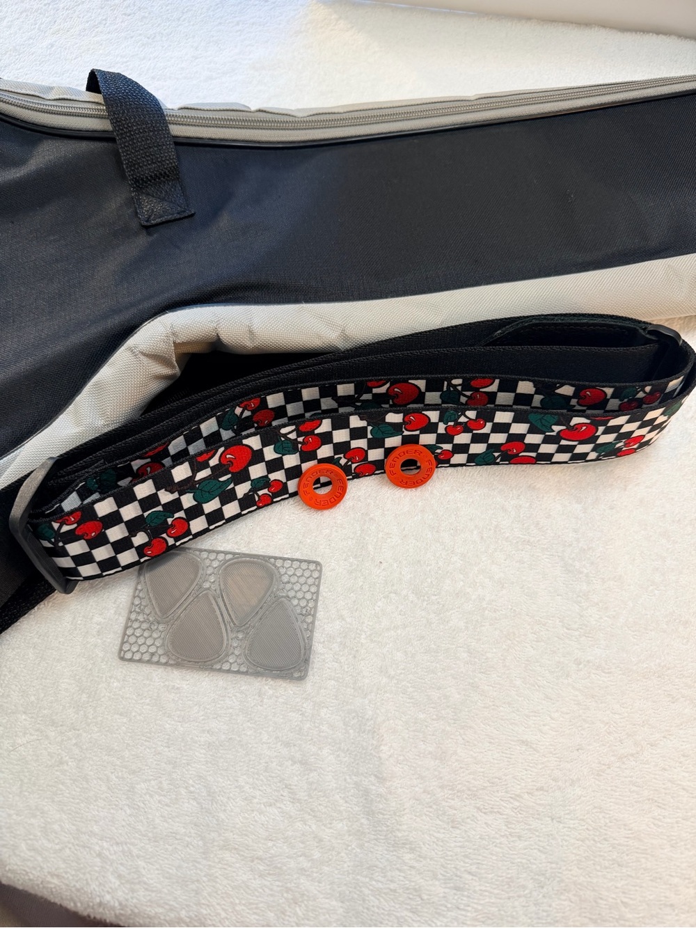 Fender Black and White Checker Strap with Red Cherry Print and Orange Buttons